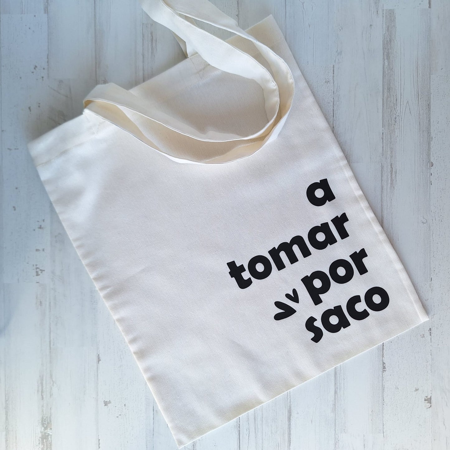 A tomar por saco · Tote bag