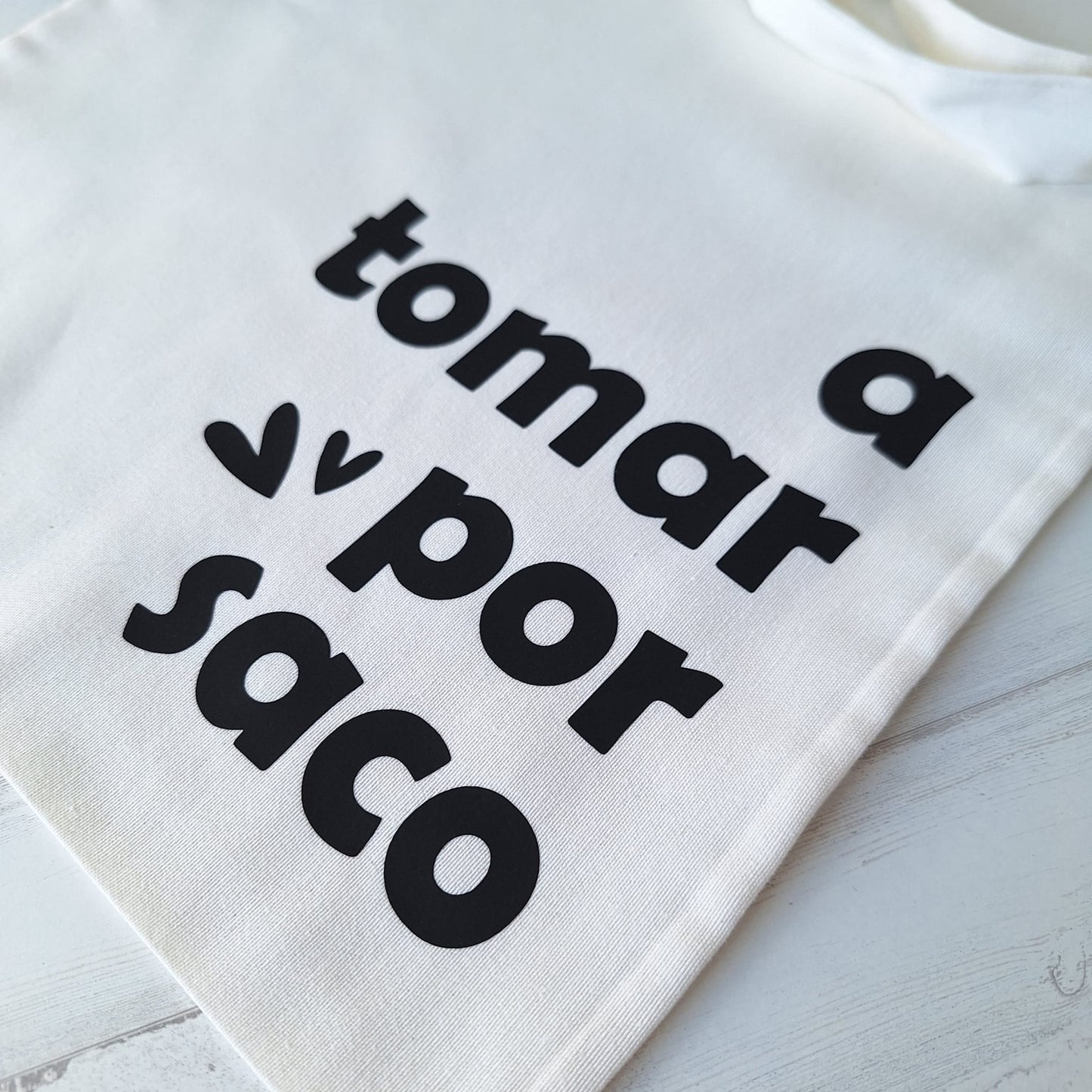 A tomar por saco · Tote bag